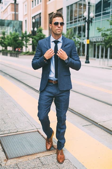 men's blue suit brown shoes.